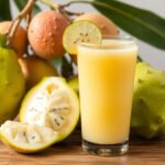 Fresh soursop fruit and a glass of soursop juice