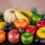 A variety of fresh, colorful juicy fruits displayed on a table.